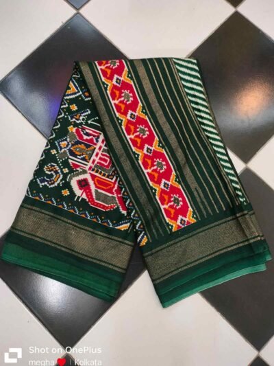 Celebrity wear patola green saree